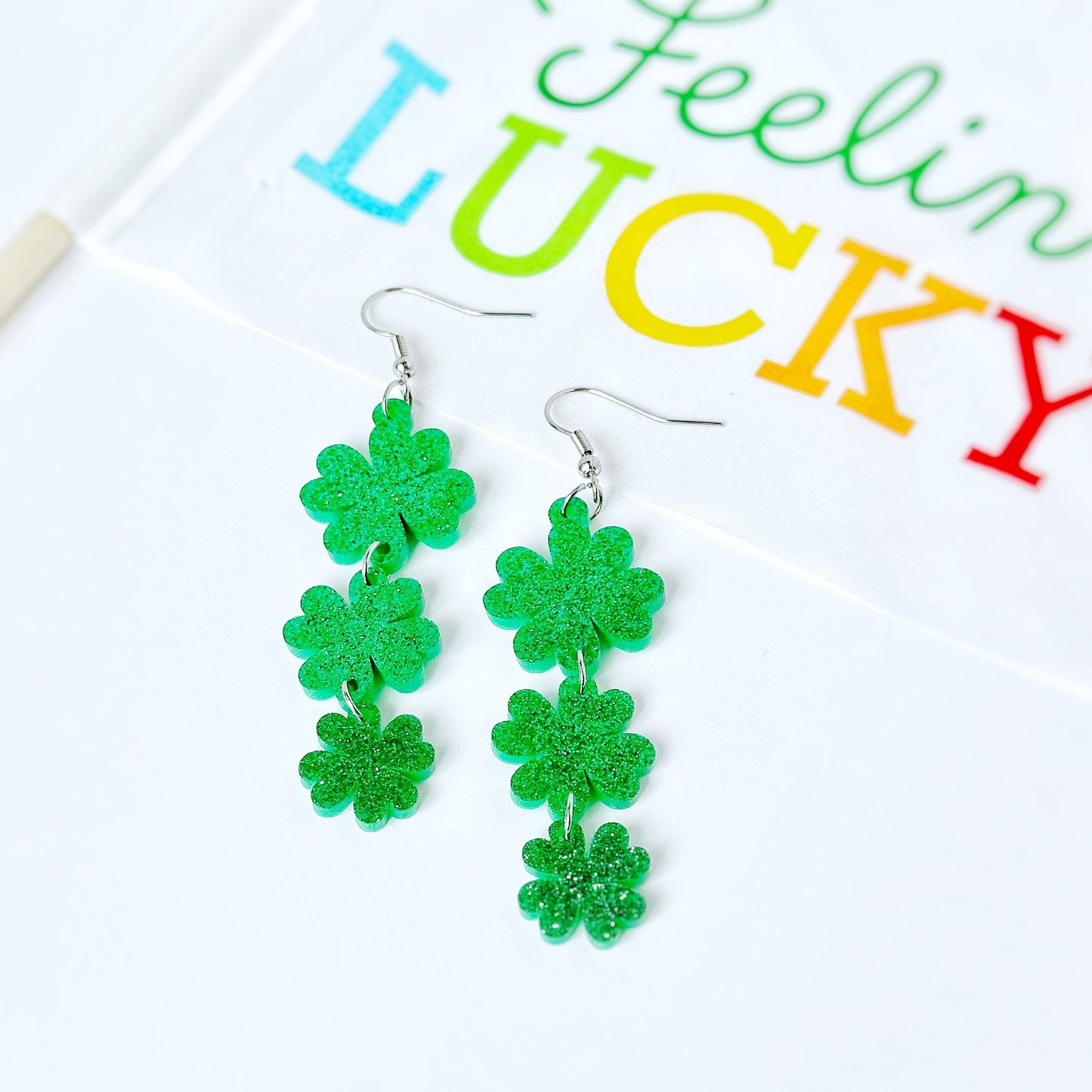 KellyMack.Co Acrylic Dangle Glitter Shamrock Earrings